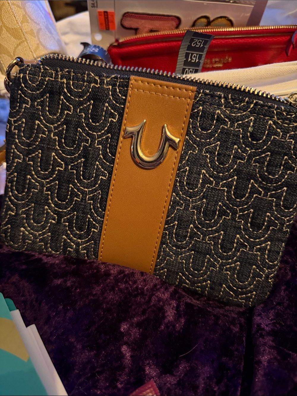 True Religion Navy Denim Logo Wristlet with Tan Center